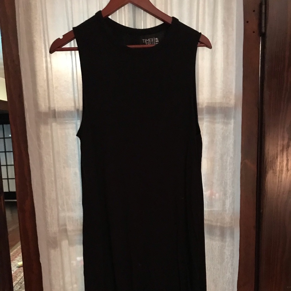 Tank dress. Falls below the knee